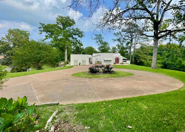 view of front of home with a front yard