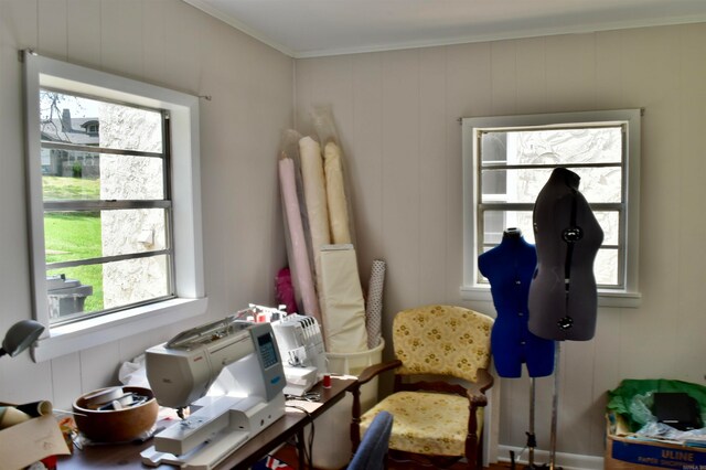 sitting room featuring crown molding