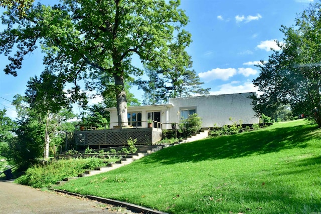 view of yard with a deck