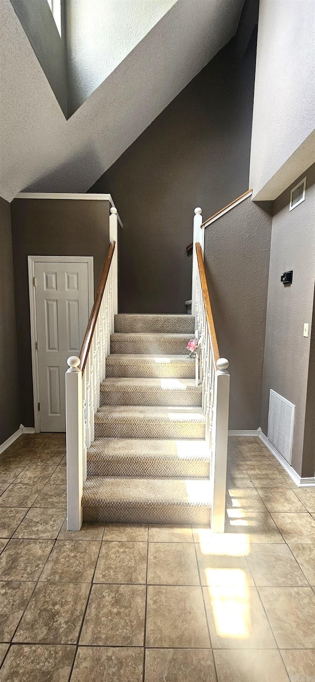 stairway with tile floors