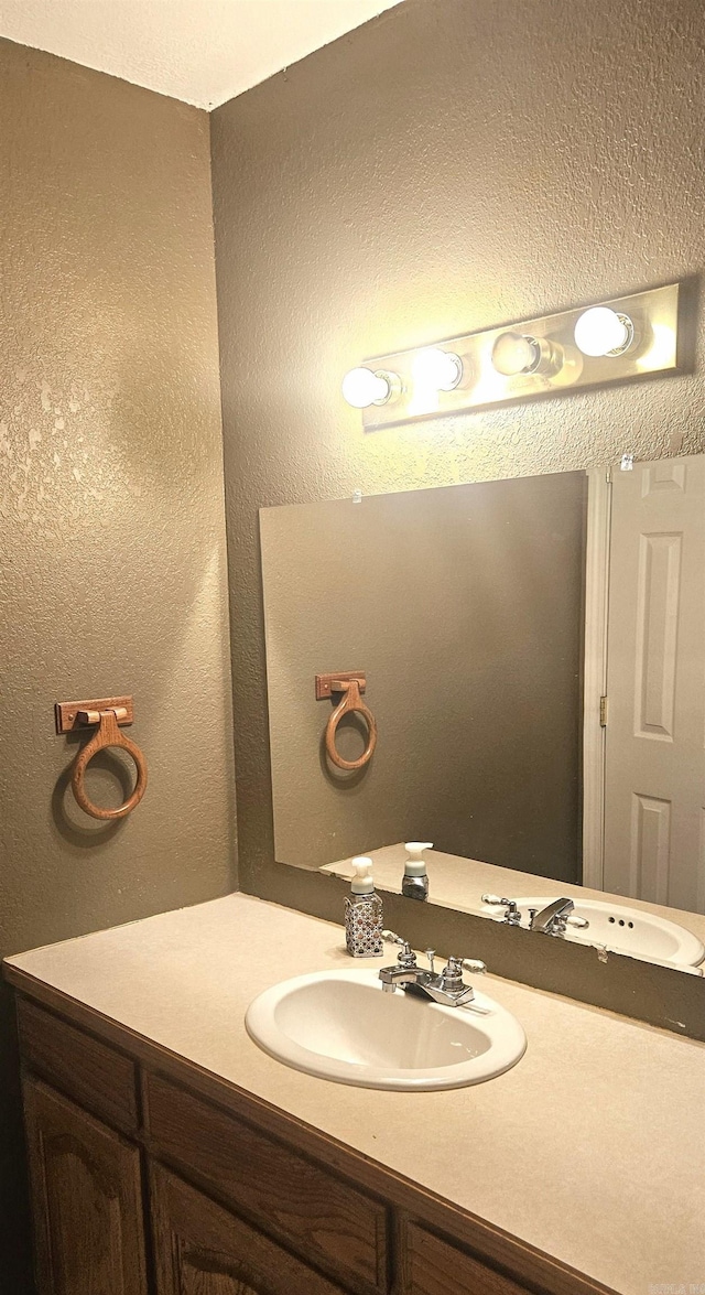 bathroom featuring large vanity