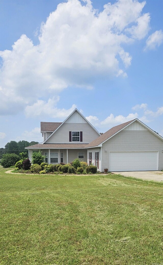 view of front facade featuring a garage and a front yard