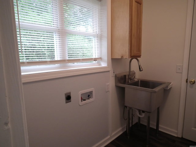 clothes washing area featuring hookup for an electric dryer, cabinets, and hookup for a washing machine