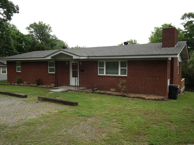 view of front of home featuring a front lawn