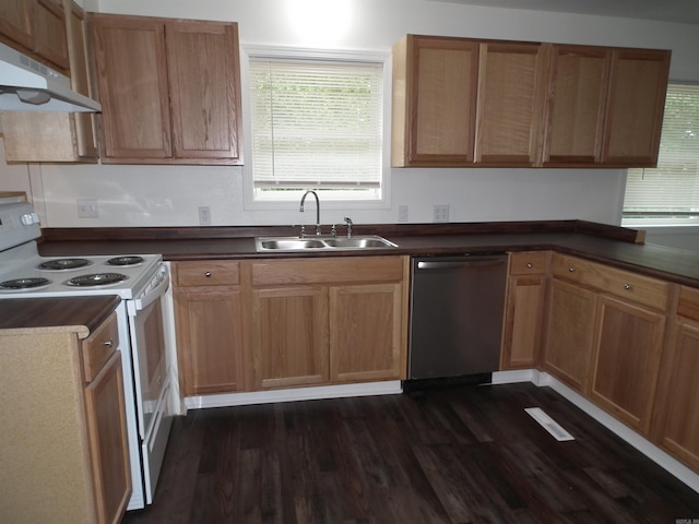 kitchen with stainless steel dishwasher, sink, dark hardwood / wood-style flooring, and white range with electric cooktop