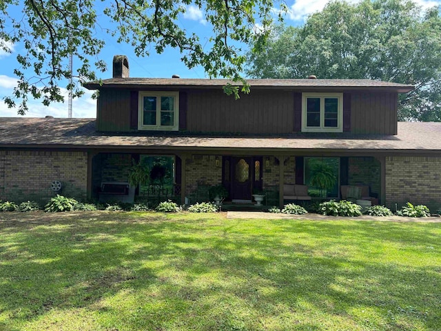 view of front of home featuring a front yard