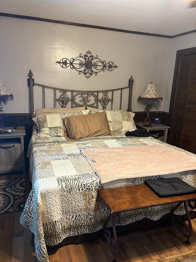 bedroom with wood-type flooring