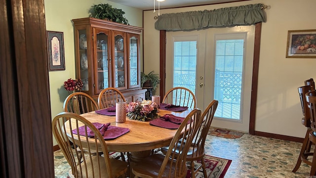 dining area featuring french doors