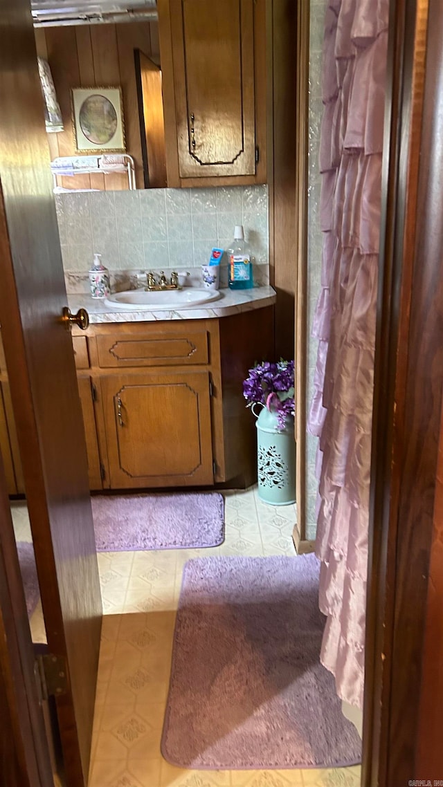 kitchen with tasteful backsplash and sink