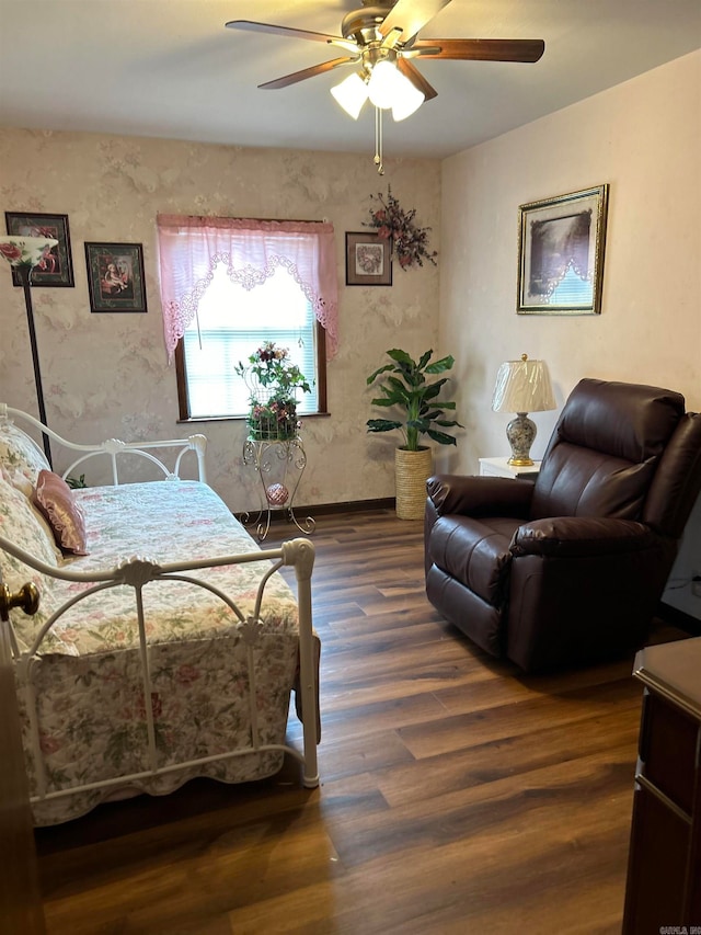 bedroom featuring dark wood-type flooring and ceiling fan