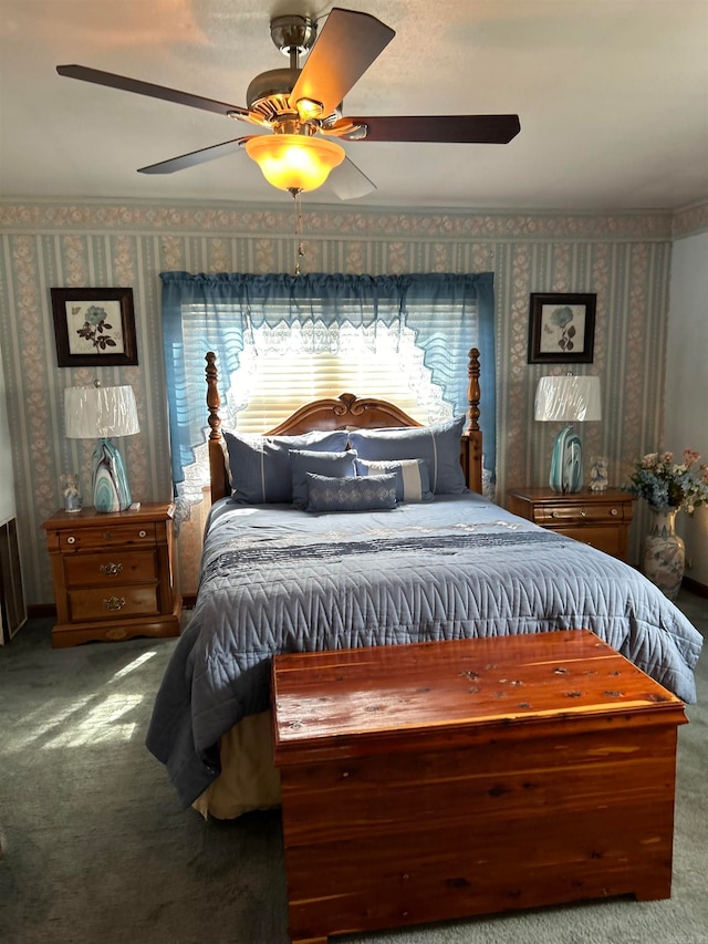 bedroom with crown molding, carpet floors, and ceiling fan