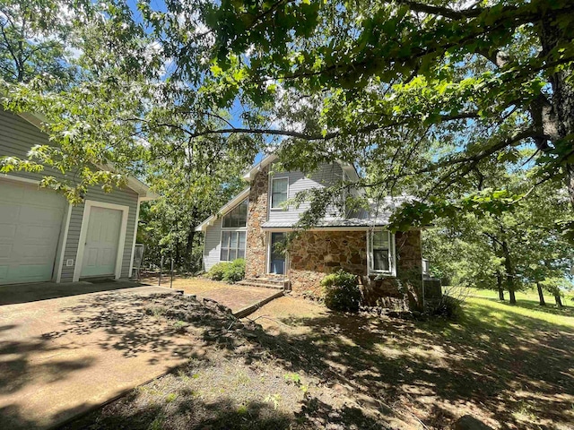 view of yard with a garage