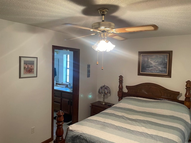 bedroom with connected bathroom, ceiling fan, and a textured ceiling