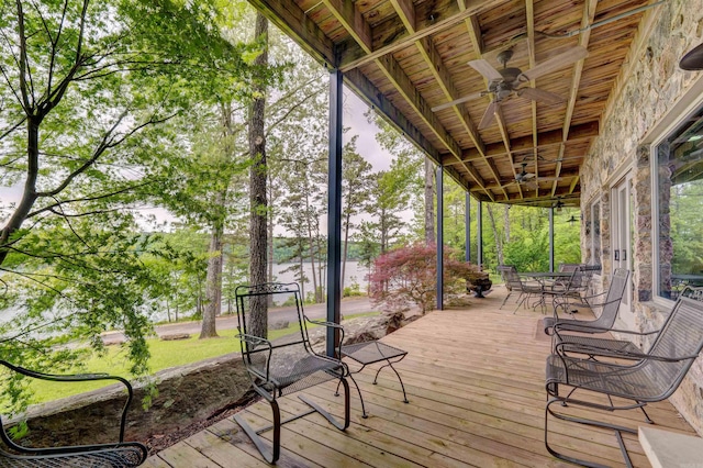 wooden terrace with ceiling fan