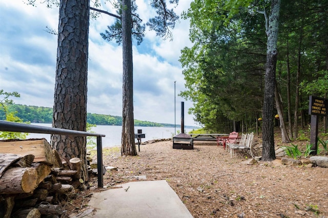 view of yard with a water view