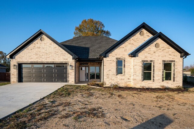 property in mid-construction featuring a garage