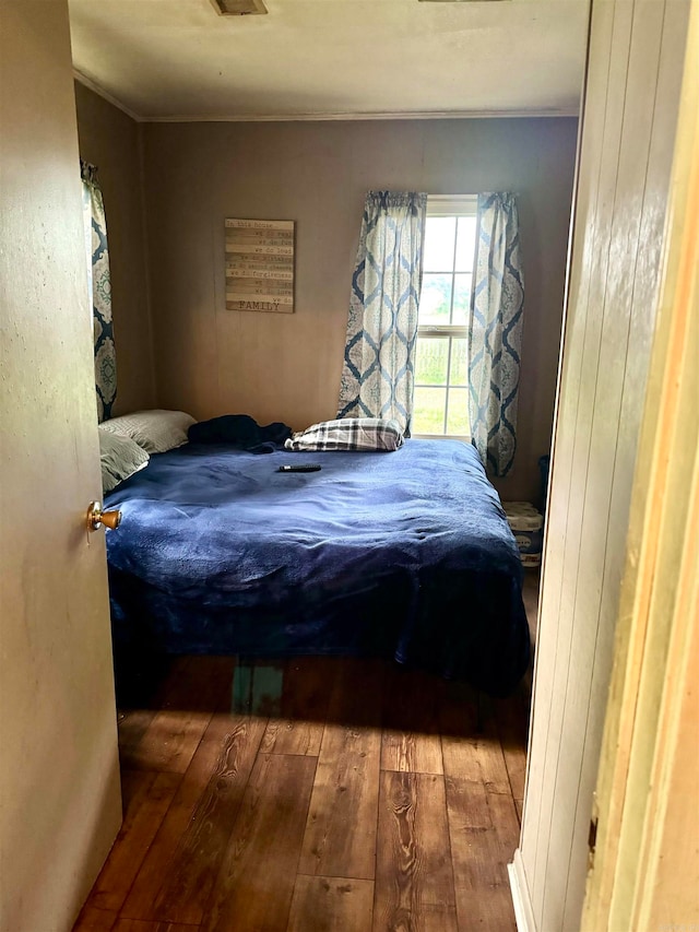 bedroom featuring wood-type flooring