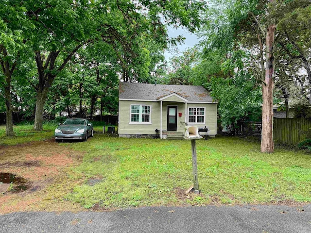 view of front of home with a front lawn