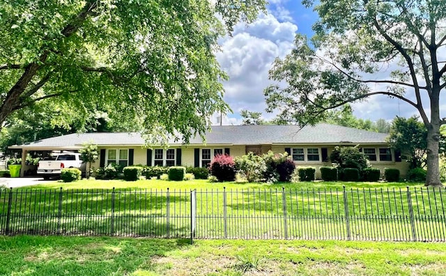 ranch-style home with a front yard