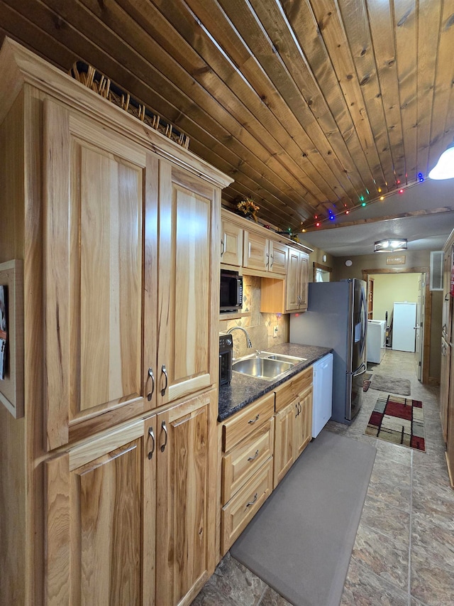 kitchen with backsplash, white dishwasher, tile floors, sink, and wooden ceiling