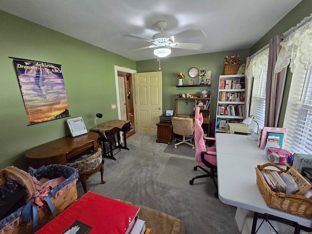 carpeted office with ceiling fan