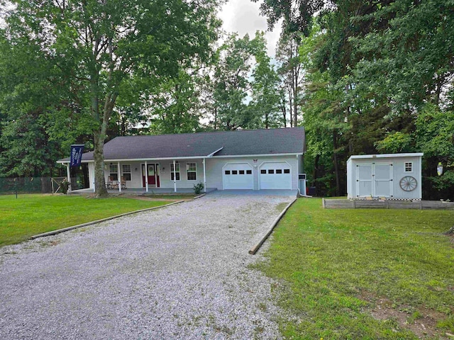 view of front of home with a garage and a front lawn