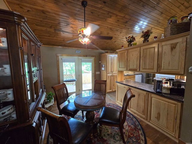 dining area featuring french doors, wood-type flooring, and ceiling fan