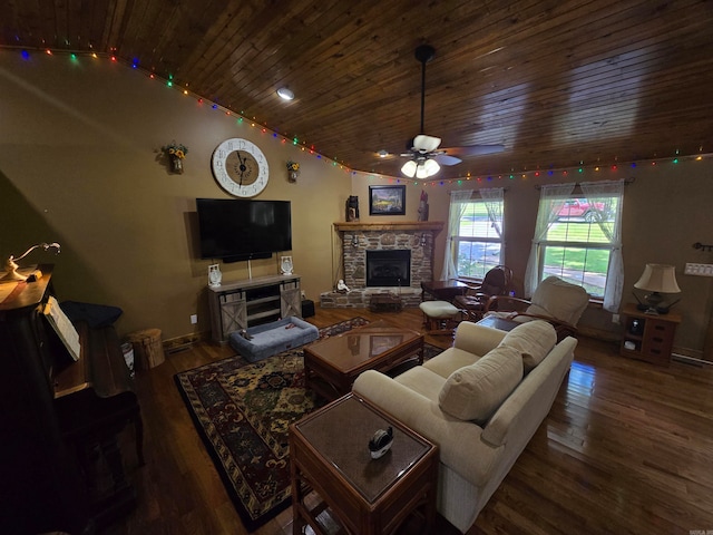 living room featuring ceiling fan, vaulted ceiling, a fireplace, wood ceiling, and dark wood-type flooring