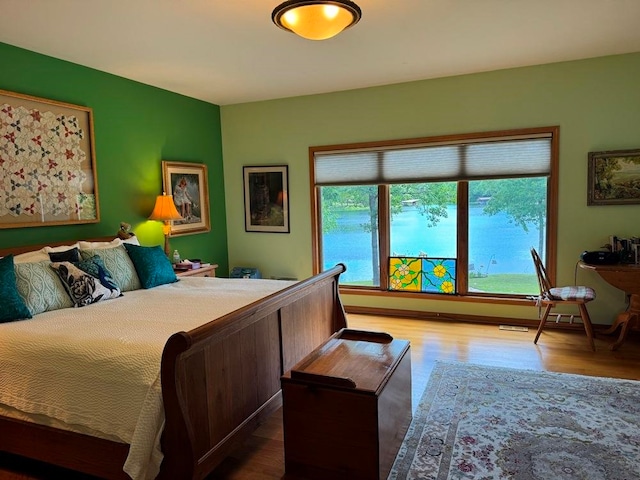 bedroom featuring hardwood / wood-style flooring