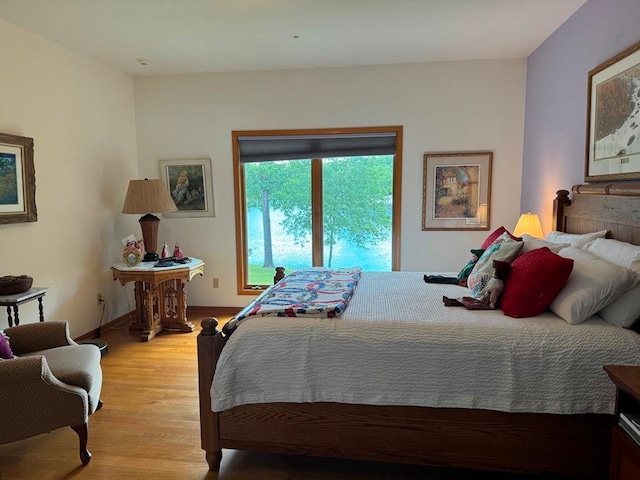 bedroom featuring hardwood / wood-style flooring