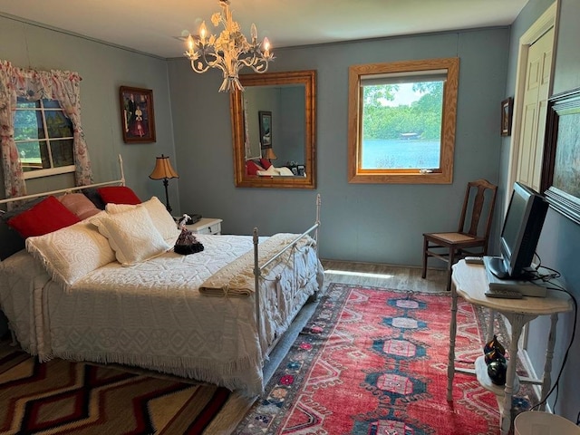 bedroom with an inviting chandelier