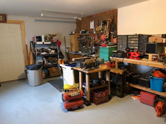 garage with a workshop area