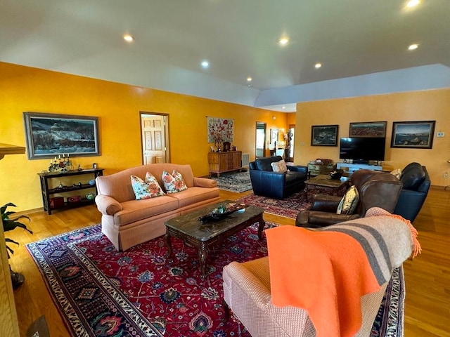 living room with light hardwood / wood-style flooring