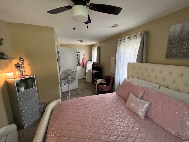 bedroom featuring ceiling fan and hardwood / wood-style floors