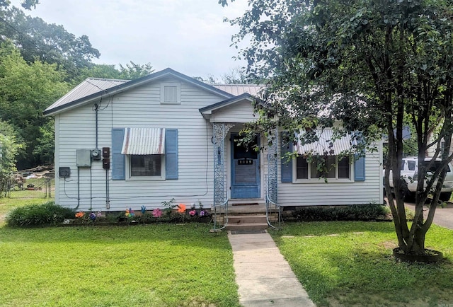 bungalow with a front lawn