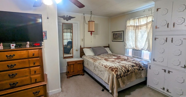 bedroom featuring light carpet, ceiling fan, and ornamental molding