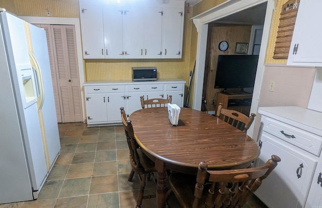 view of tiled dining space