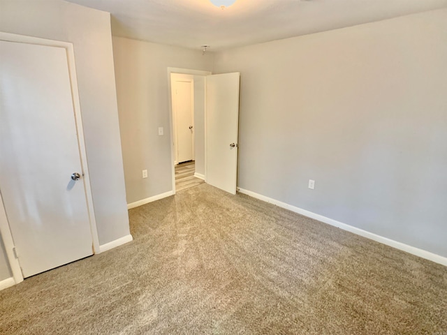 unfurnished bedroom featuring carpet floors