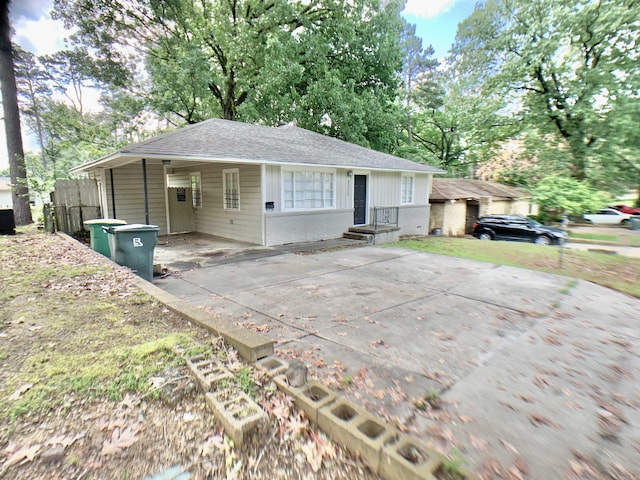 view of front of house featuring a carport