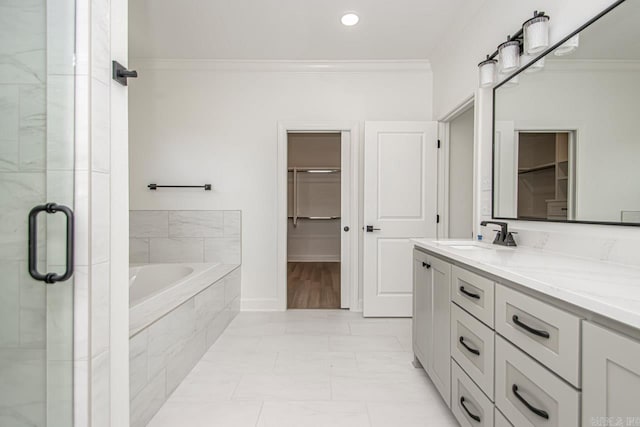 bathroom with separate shower and tub, vanity, tile floors, and crown molding