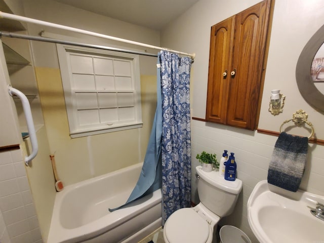 508 State St, Greenway, AR 72430 - full bath with tile walls, toilet, a sink, shower / bath combination with curtain, and wainscoting