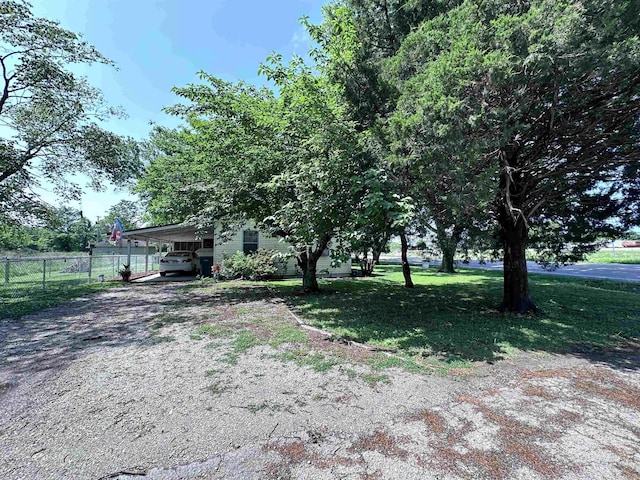 508 State St, Greenway, AR 72430 - view of front facade featuring a carport