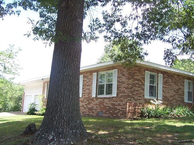 view of property exterior featuring a yard