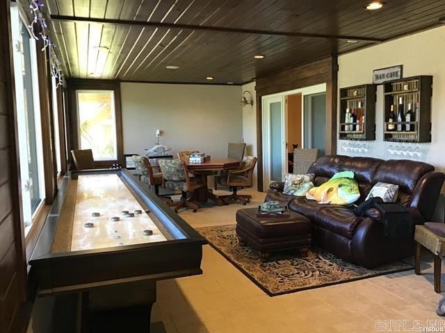 rec room with wooden ceiling