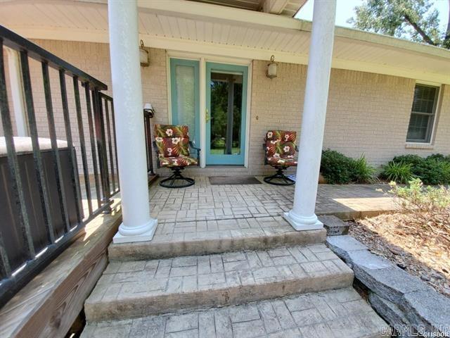 doorway to property featuring covered porch