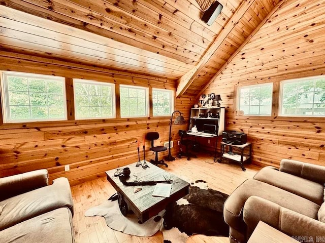 living room featuring wooden ceiling, lofted ceiling with beams, plenty of natural light, and hardwood / wood-style floors