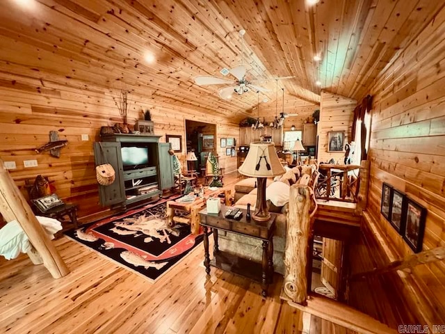 living room with wooden ceiling, lofted ceiling, ceiling fan, and hardwood / wood-style floors