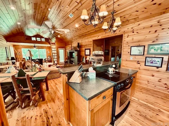 kitchen with electric range, light hardwood / wood-style floors, and vaulted ceiling