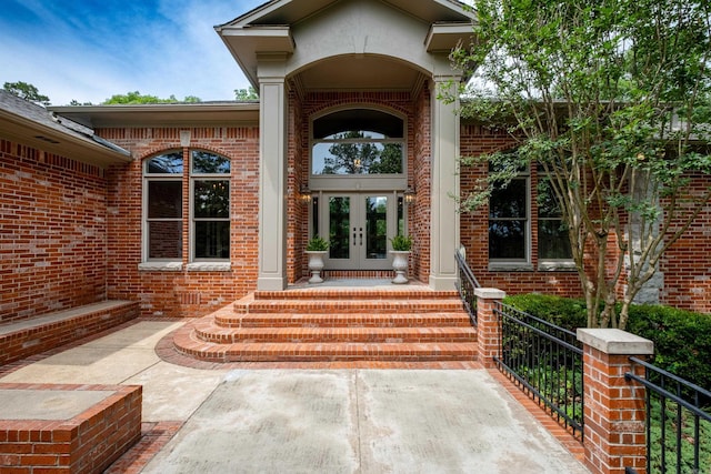 entrance to property featuring french doors