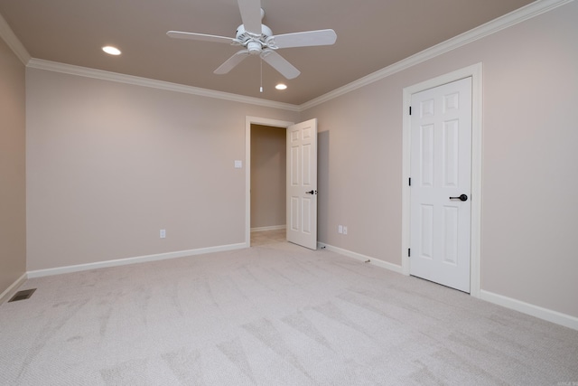 unfurnished bedroom with light carpet, crown molding, and ceiling fan